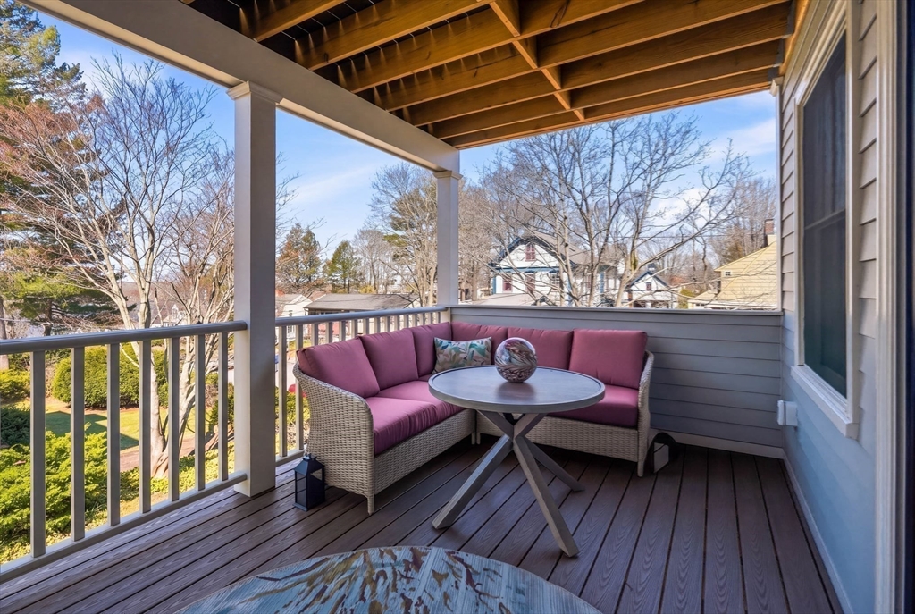 20 Lawrence Street, Unit 2 Wakefield, MA 01880 - Photo 20 of 38 a view of a chairs on the deck