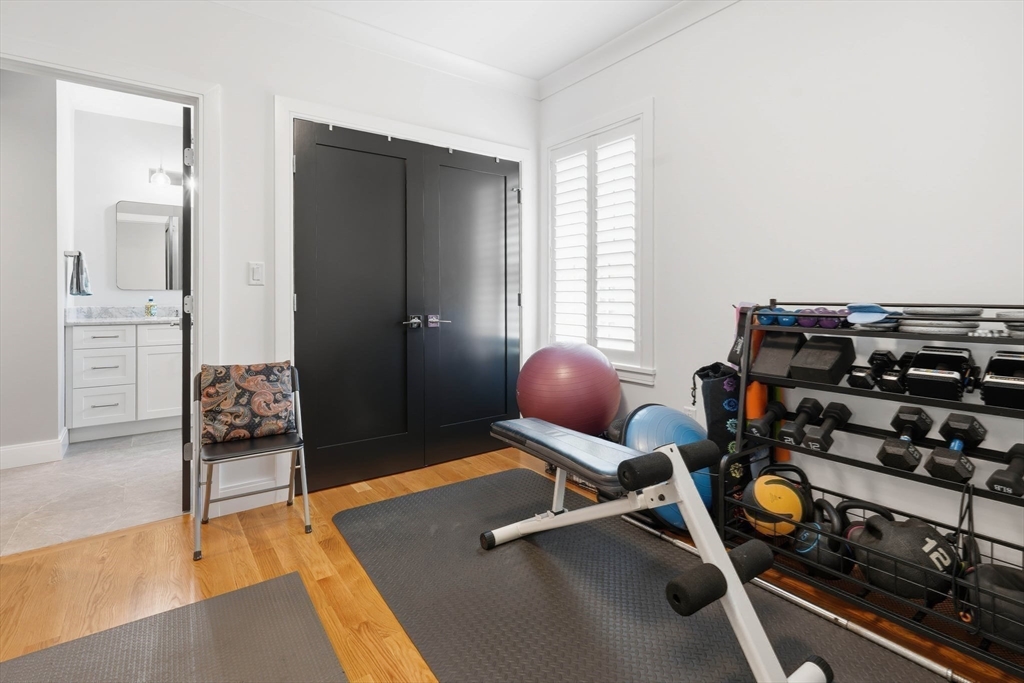 20 Lawrence Street, Unit 2 Wakefield, MA 01880 - Photo 29 of 38 a room with gym equipment
