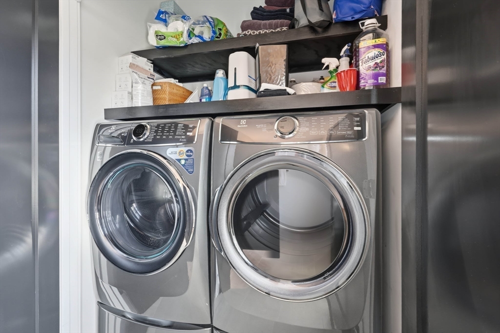 20 Lawrence Street, Unit 2 Wakefield, MA 01880 - Photo 34 of 38 a utility room with dryer and washer
