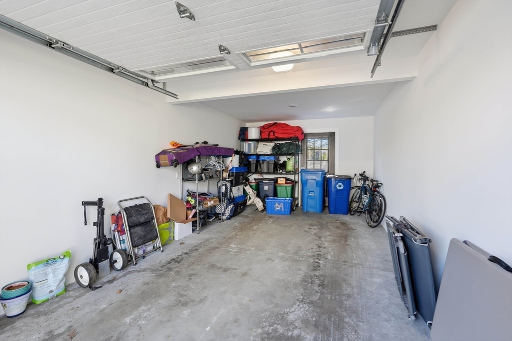 20 Lawrence Street, Unit 2 Wakefield, MA 01880 - Photo 37 of 38 a view of a storage room with a lot of stuff