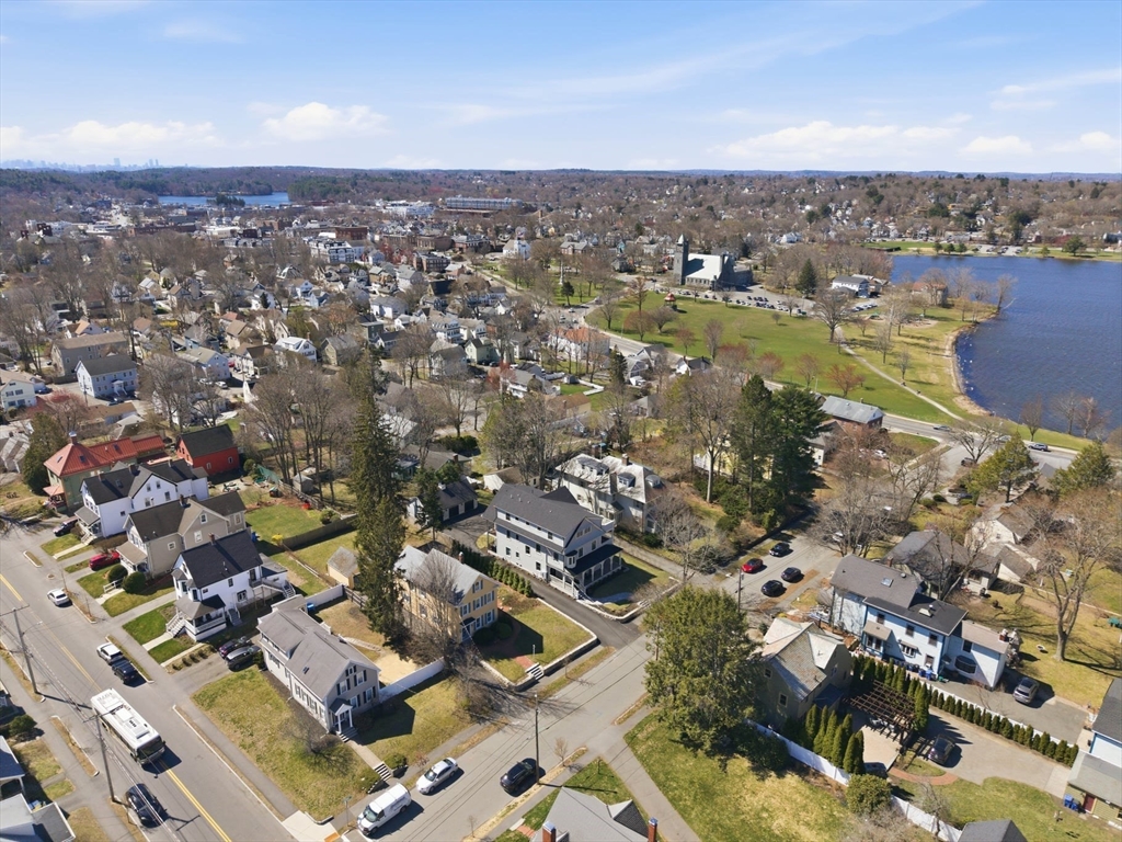 20 Lawrence Street, Unit 2 Wakefield, MA 01880 - Photo 4 of 38 an aerial view of a city with lots of residential buildings
