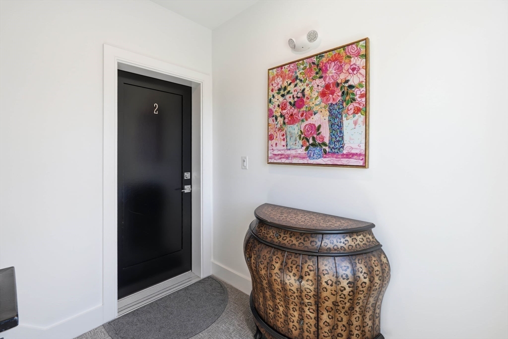 20 Lawrence Street, Unit 2 Wakefield, MA 01880 - Photo 8 of 38 a view of painting on the wall
