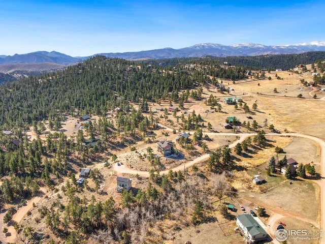 a view of a city with mountain