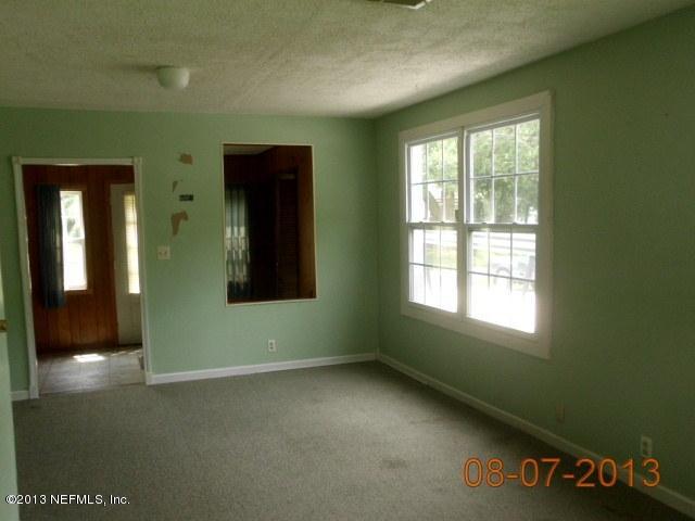 1835 Lilly Road East Jacksonville, FL 32207 - Photo 5 of 11 a view of an empty room with window