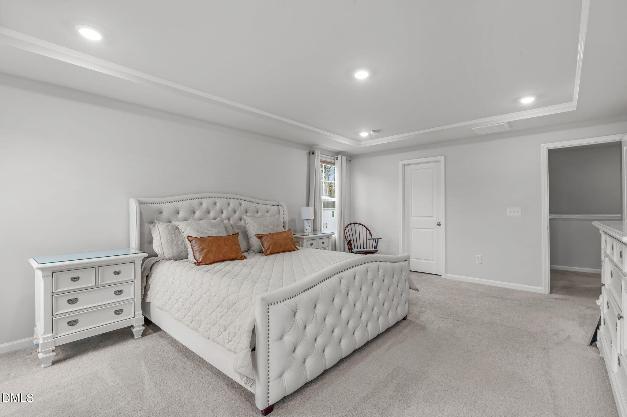 1809 Barrett Run Trail Apex, NC 27502 - Photo 20 of 37 a bedroom with a bed and a night stand