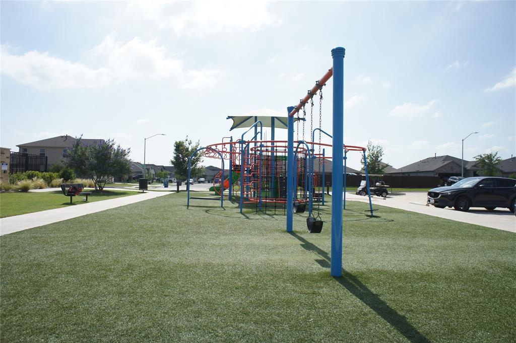 16428 Milwaukee Street Justin, TX 76247 - Photo 13 of 16 a view of outdoor space with seating area