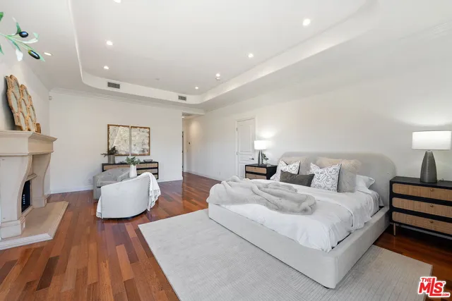 a bedroom with furniture and a couch