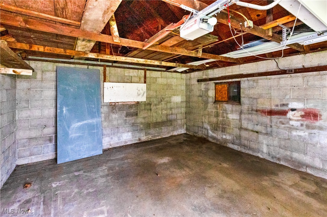 7529 State Line Burghill, OH 44404 - Photo 23 of 23 Below grade area featuring a garage
