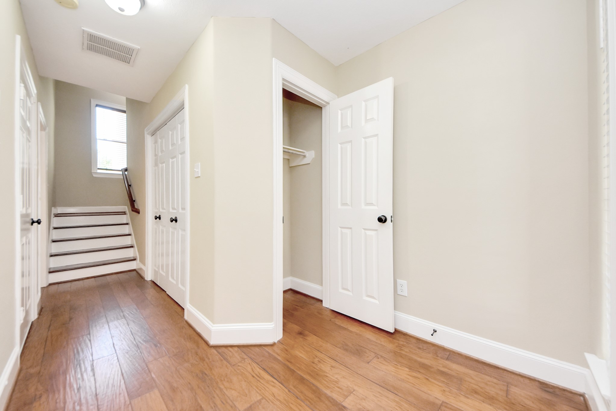 2119 Stuart Street Houston, TX 77004 - Photo 4 of 37 Beautiful wood flooring greets you as you enter, and the closet is a bonus!