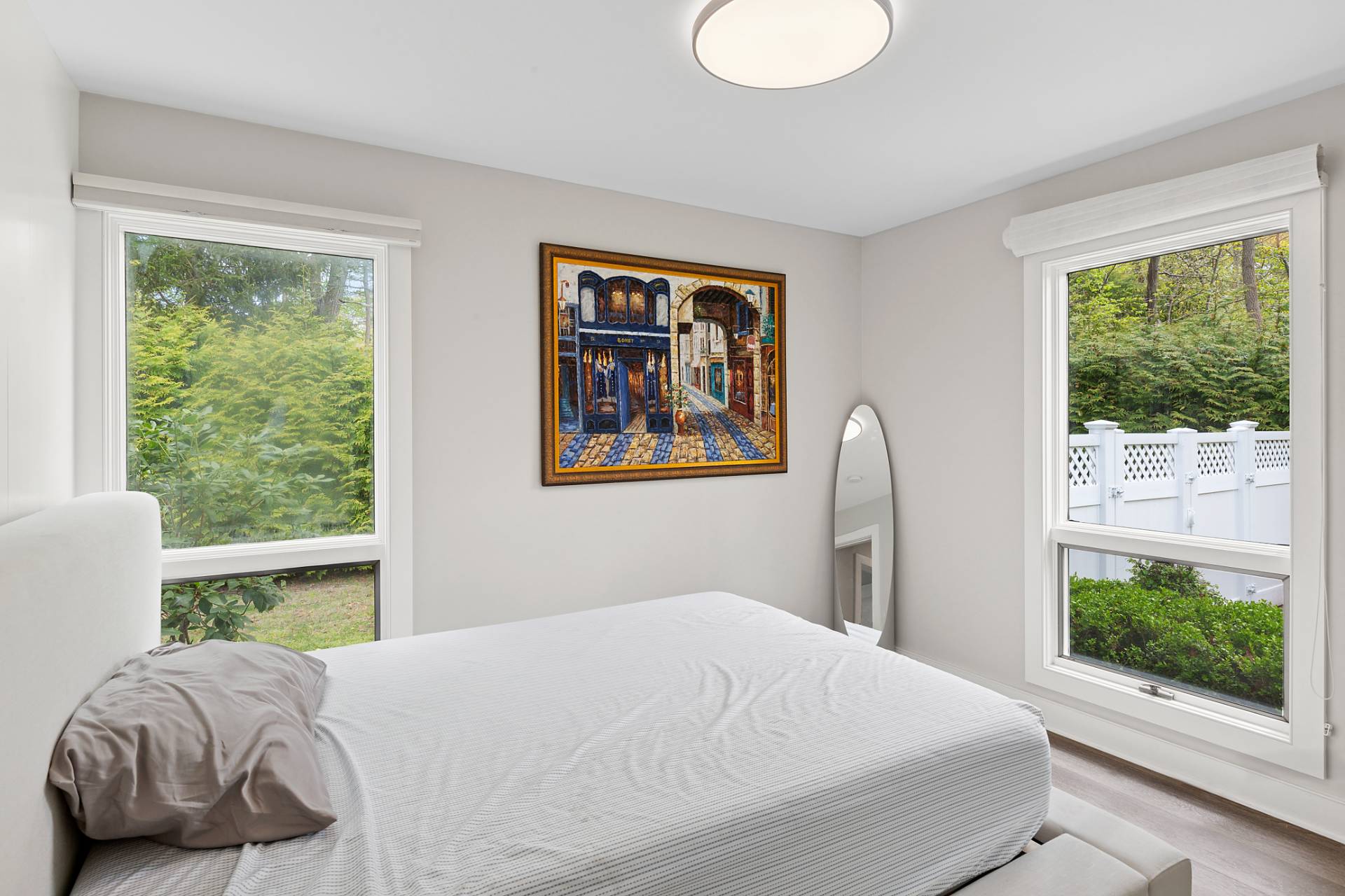 60 Cedar Drive East Hampton, NY 11937 - Photo 6 of 11 a bedroom with a bed and a large window