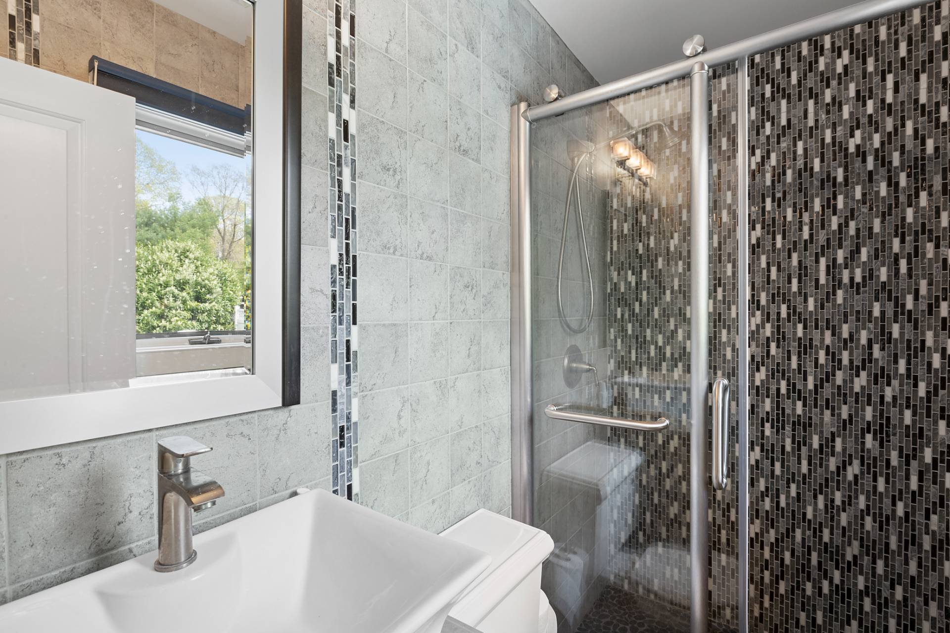 60 Cedar Drive East Hampton, NY 11937 - Photo 8 of 11 a bathroom with a shower and a sink