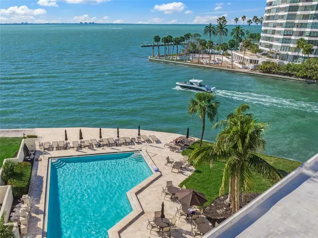 a view of a lake with a yard