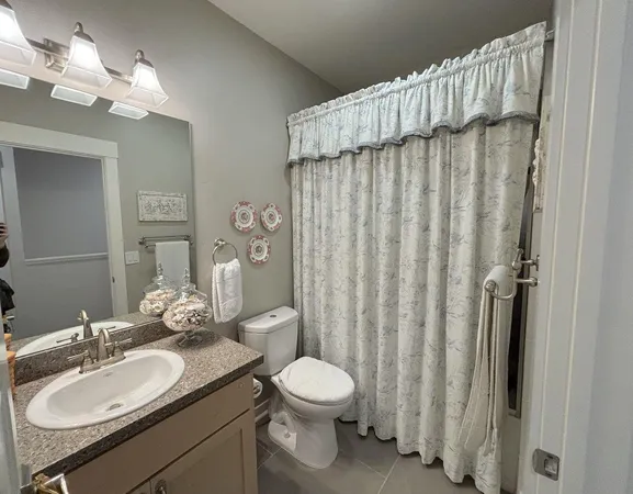 a view of a hallway with washer and dryer