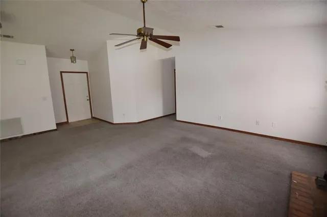 a view of a room with a hallway