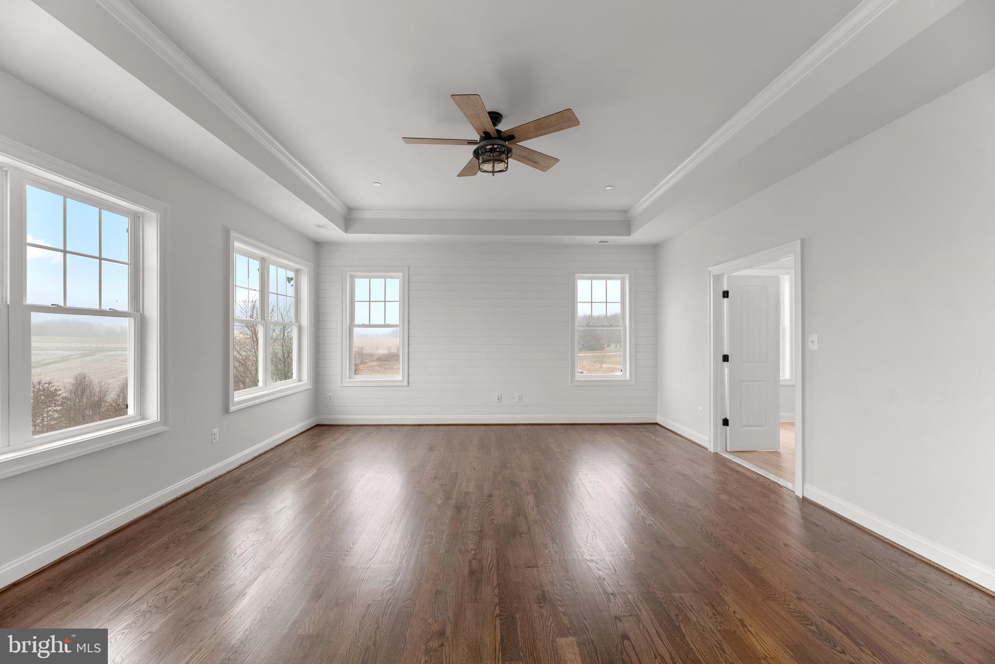 14628 Old Hanover Road, Unit TULARE Reisterstown, MD 21136 - Photo 29 of 60 wooden floor in an empty room with a window