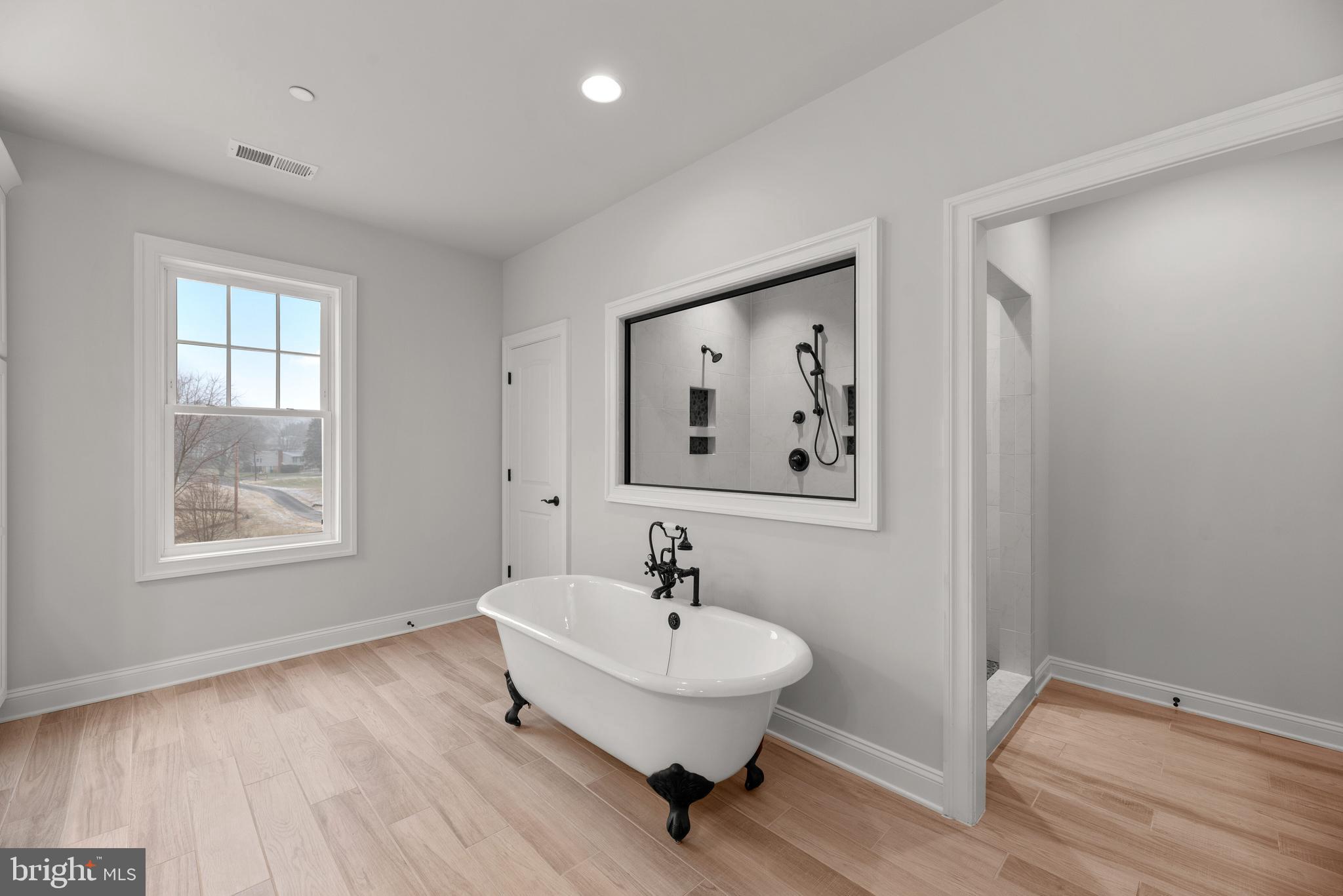 14628 Old Hanover Road, Unit TULARE Reisterstown, MD 21136 - Photo 34 of 60 a bedroom with a bed and a window