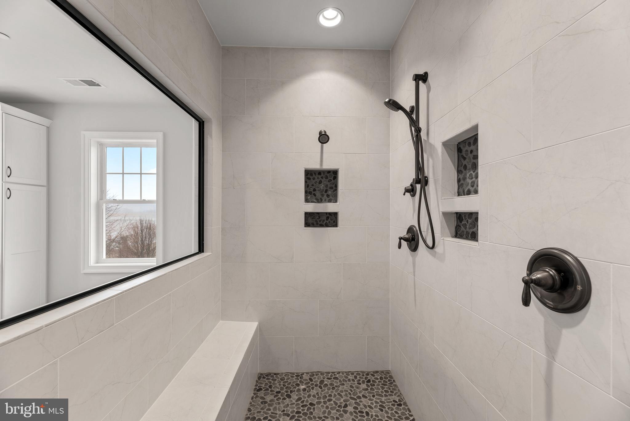 14628 Old Hanover Road, Unit TULARE Reisterstown, MD 21136 - Photo 37 of 60 a bathroom with a sink and a mirror