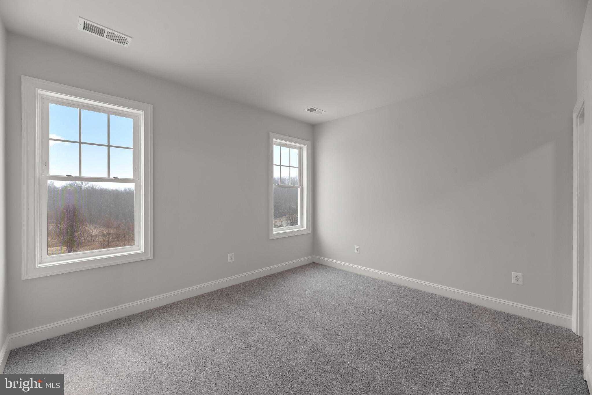 14628 Old Hanover Road, Unit TULARE Reisterstown, MD 21136 - Photo 41 of 60 an empty room with windows