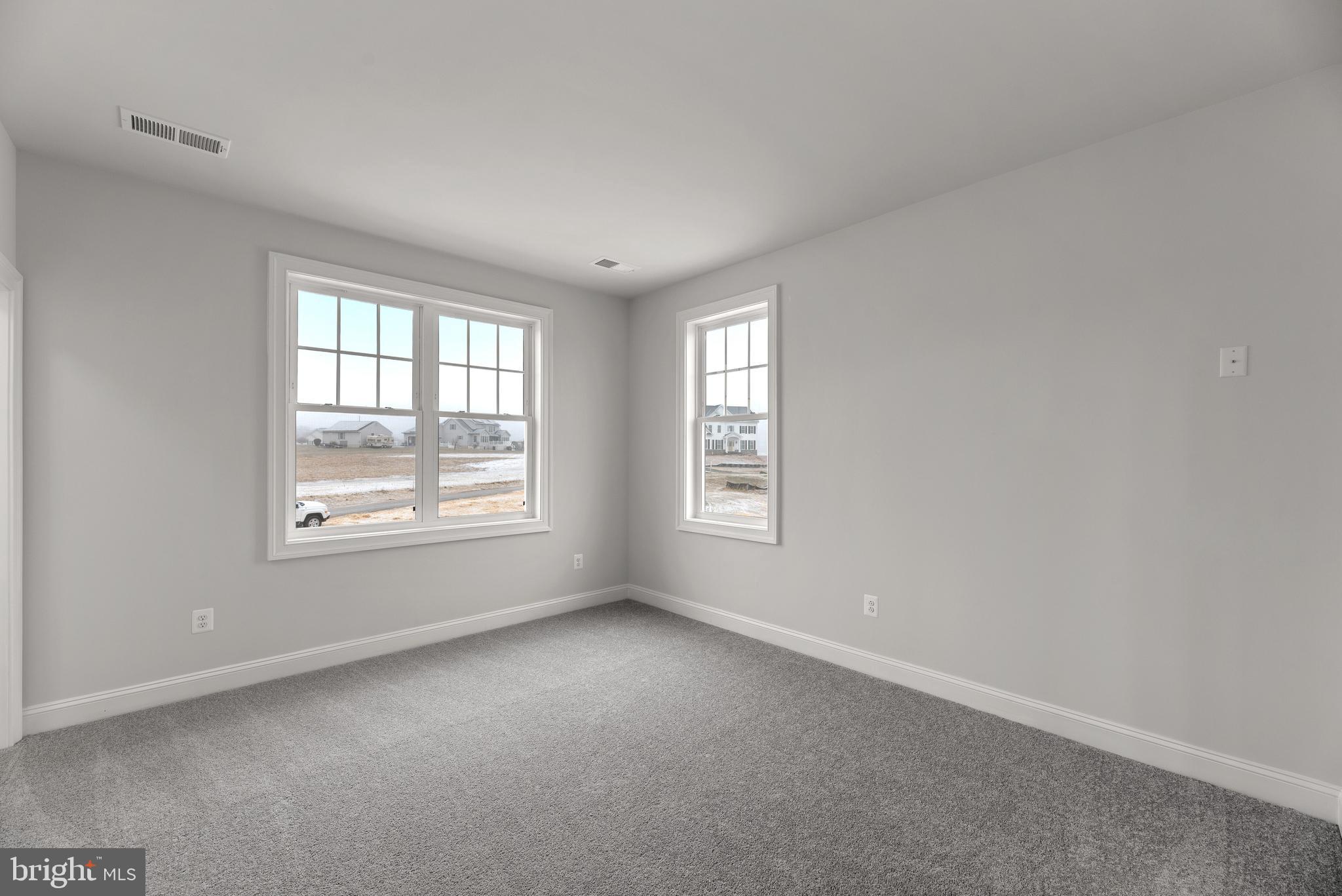 14628 Old Hanover Road, Unit TULARE Reisterstown, MD 21136 - Photo 45 of 60 an empty room with windows