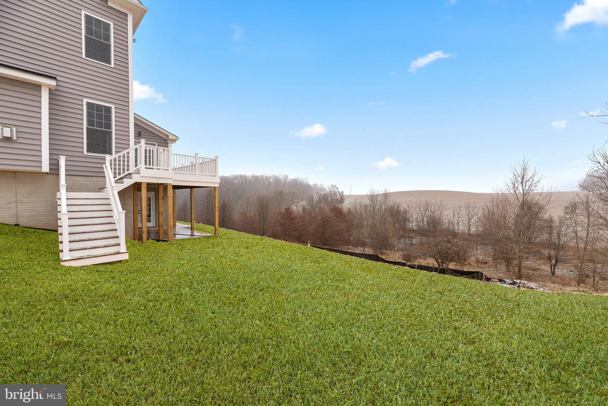 14628 Old Hanover Road, Unit TULARE Reisterstown, MD 21136 - Photo 57 of 60 a view of a house with a backyard