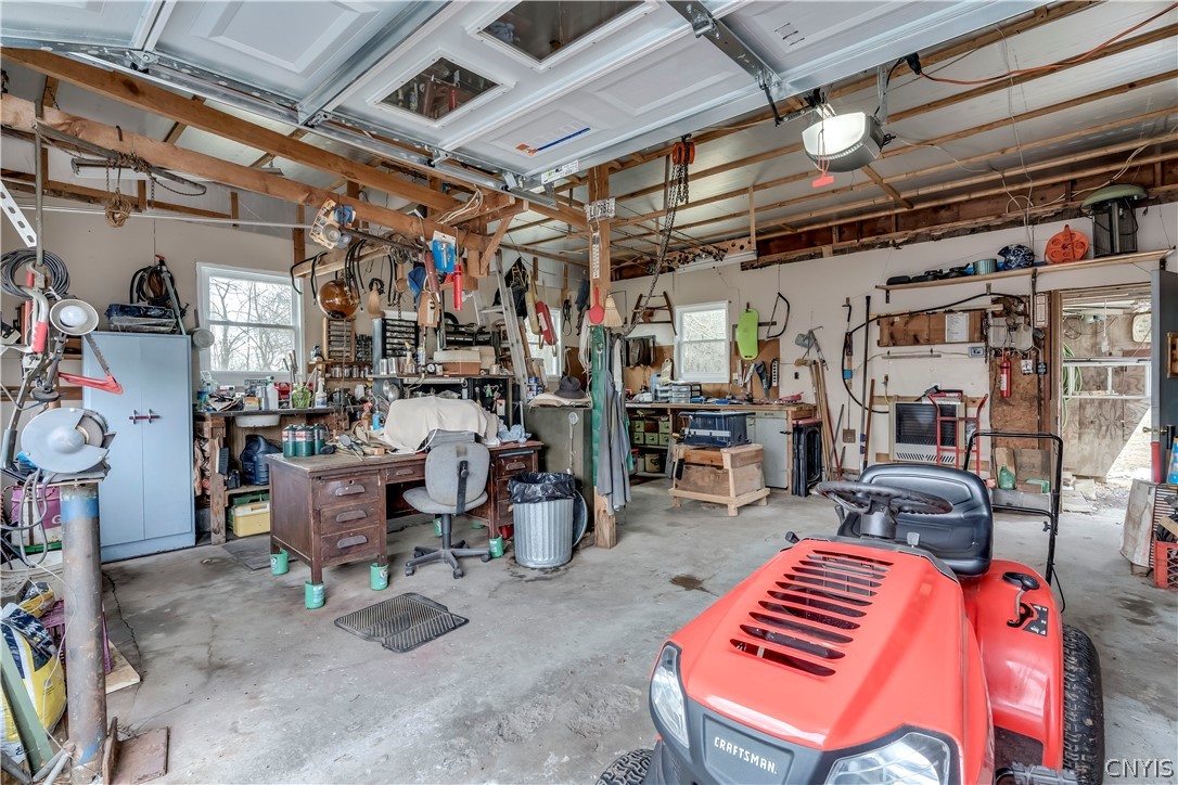 20710 Reasoner Road Brownville, NY 13601 - Photo 36 of 40 Garage with workshop along back wall