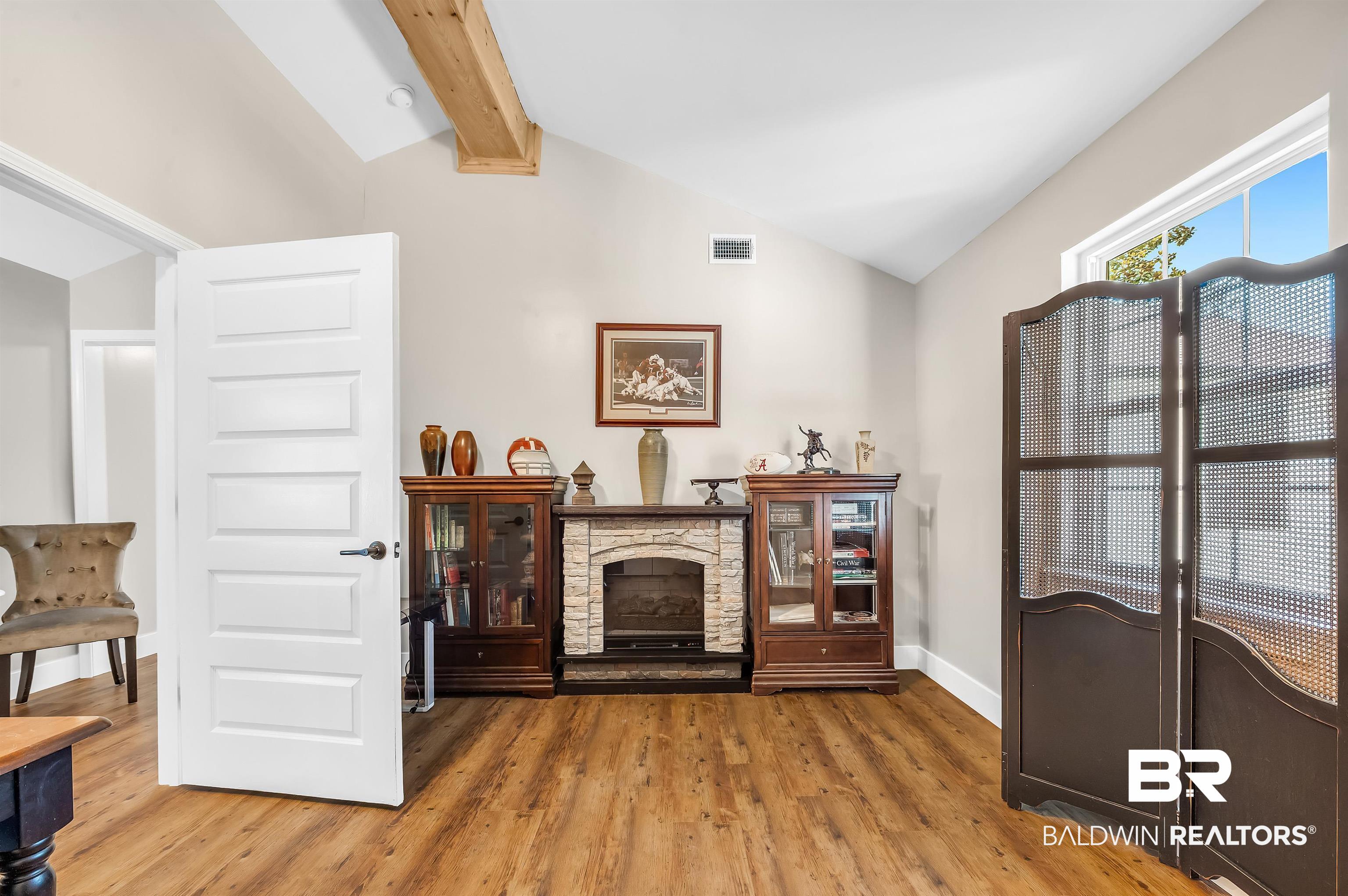5215 Pine Road Orange Beach, AL 36561 - Photo 51 of 60 Living room featuring light wood finished floors and baseboards