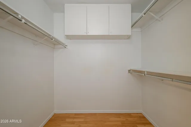 a view of a room with racks on the wall