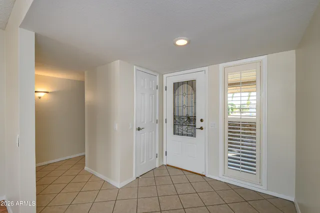 a view of an empty room and window