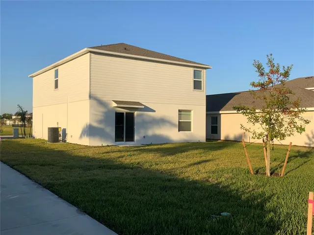 a view of house with backyard porch and entertaining space