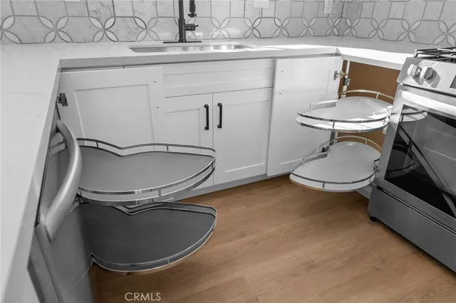 a bathroom with a sink and mirror