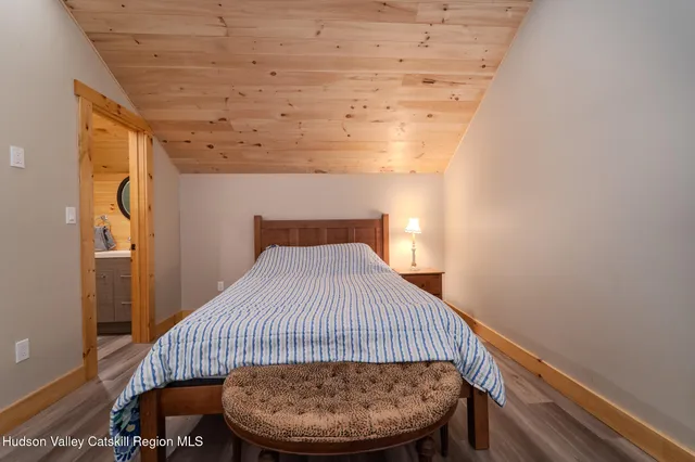 a view of balcony with wooden floor