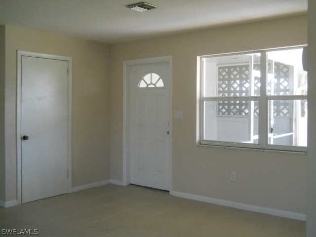 803 East Bougainvillea Road Lehigh Acres, FL 33936 - Photo 7 of 20 a view of empty room with window
