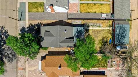 aerial view of a house with a yard