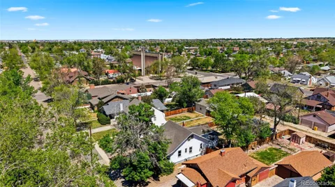 an aerial view of a house with a trees