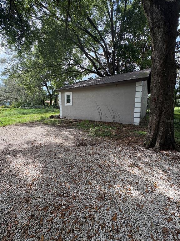 5320 Cherry Avenue Seffner, FL 33584 - Photo 18 of 21 a house with a tree in the background