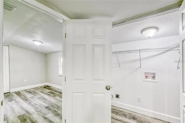 a bathroom with a sink and shower