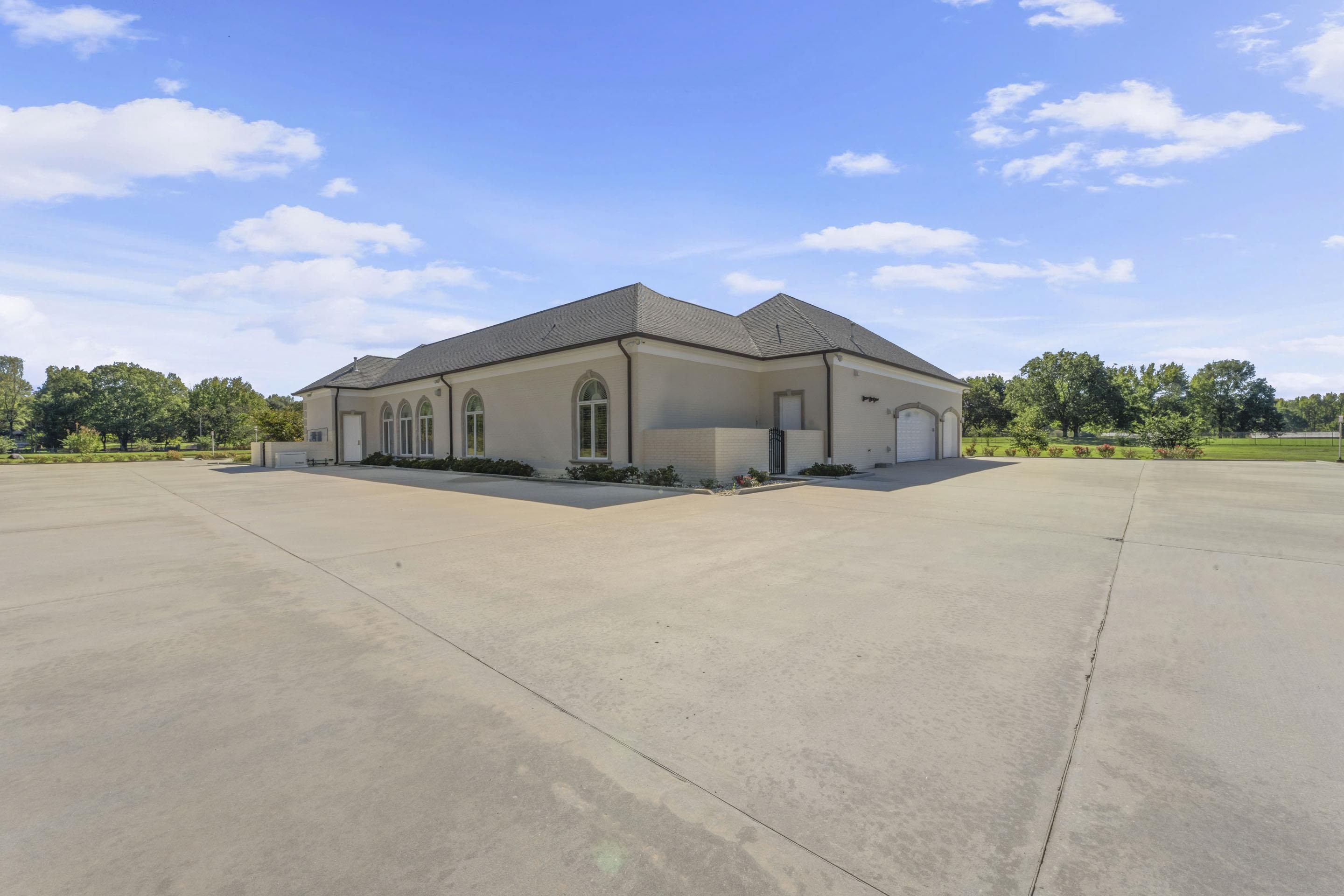 881 Bray Station Road Collierville, TN 38017 - Photo 29 of 40 a view of a house with a yard