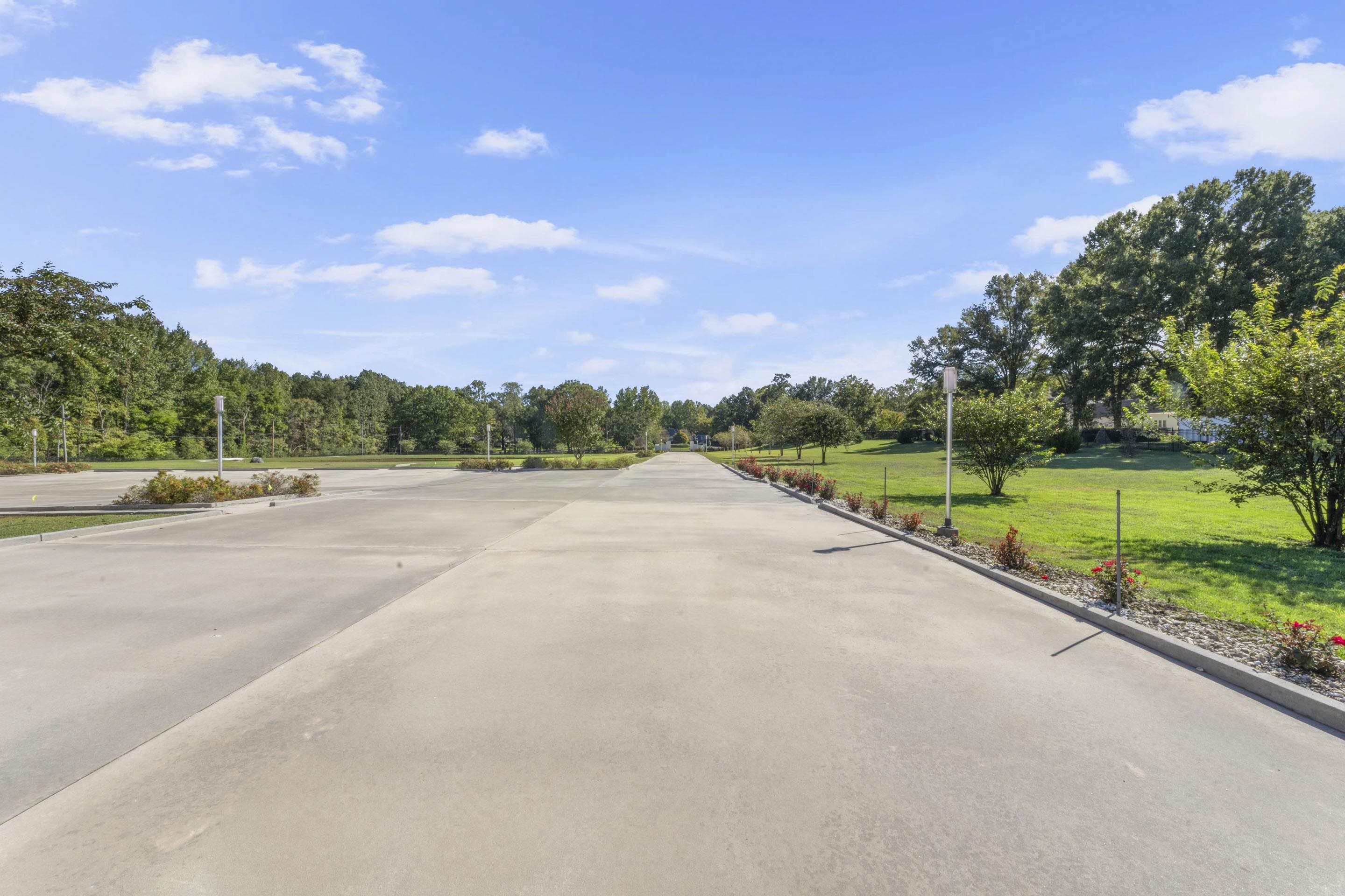 881 Bray Station Road Collierville, TN 38017 - Photo 33 of 40 a view of a street with a big yard
