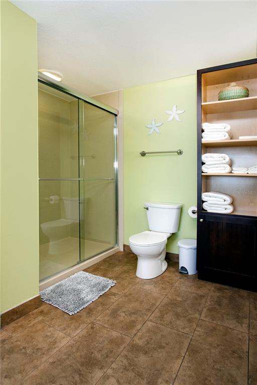 399 2nd Street, Unit 417 Indian Rocks Beach, FL 33785 - Photo 11 of 35 a bathroom with a sink and a shower