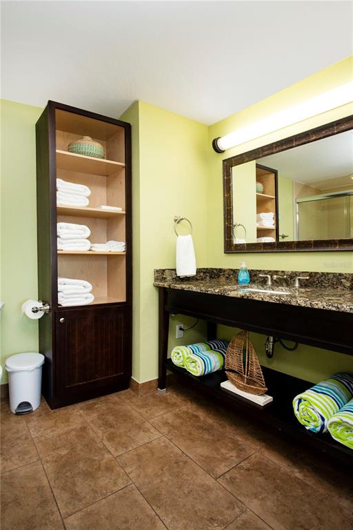 399 2nd Street, Unit 417 Indian Rocks Beach, FL 33785 - Photo 12 of 35 a bathroom with a sink and a mirror