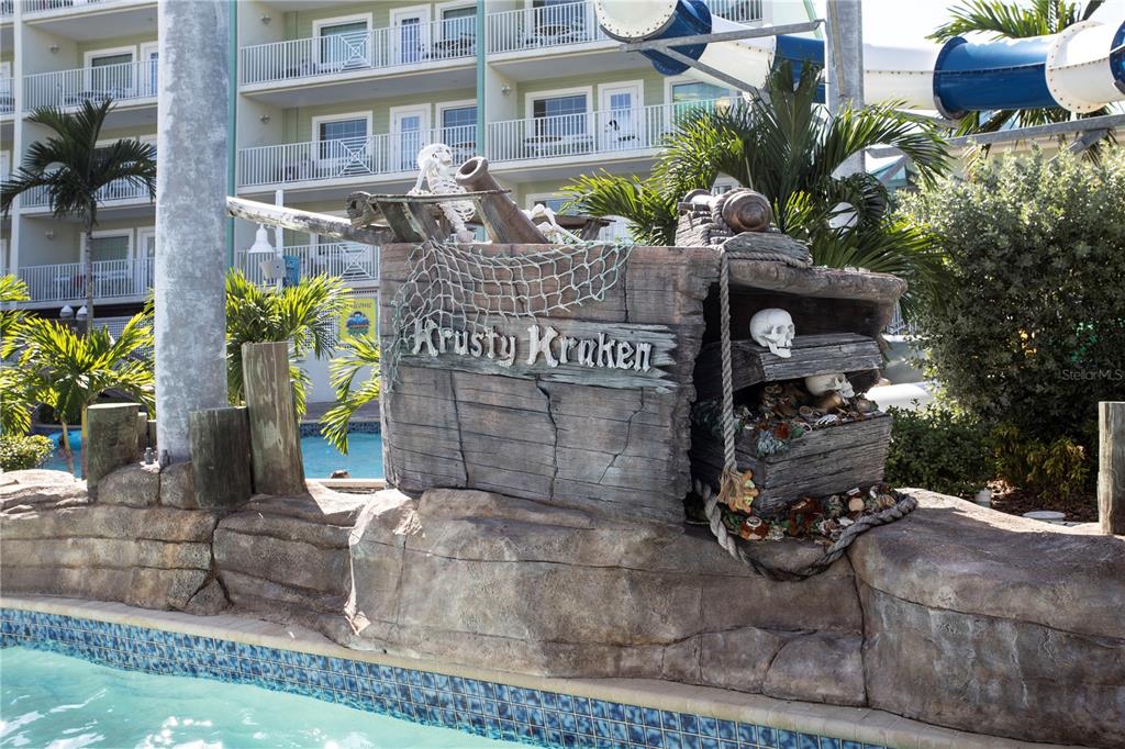 399 2nd Street, Unit 417 Indian Rocks Beach, FL 33785 - Photo 23 of 35 front view of a house with a garden