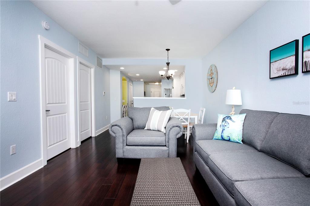 399 2nd Street, Unit 417 Indian Rocks Beach, FL 33785 - Photo 4 of 35 a living room with furniture and a couch