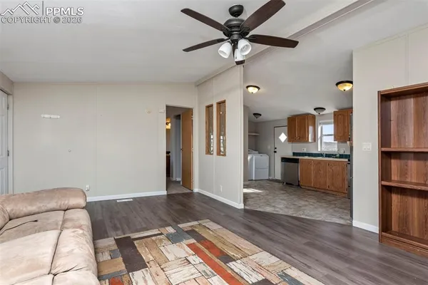 a bedroom with a bed and a mirror