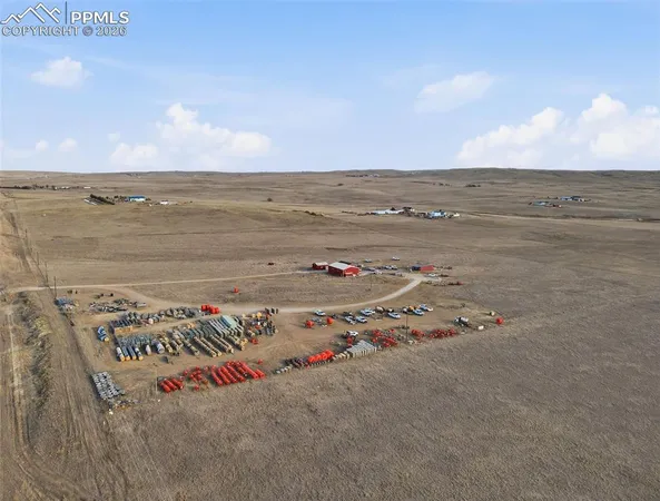 a view of steet with a couch and chairs