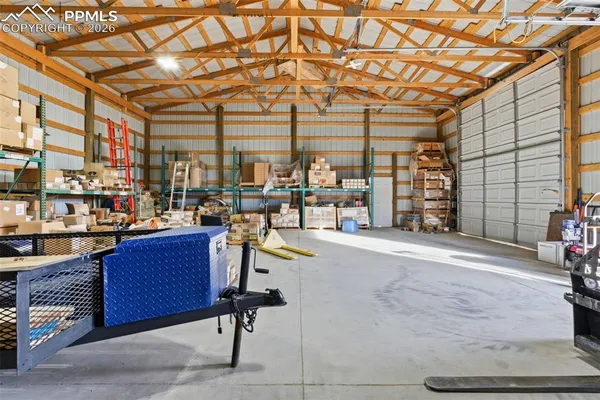a view of kitchen with cabinets and furniture