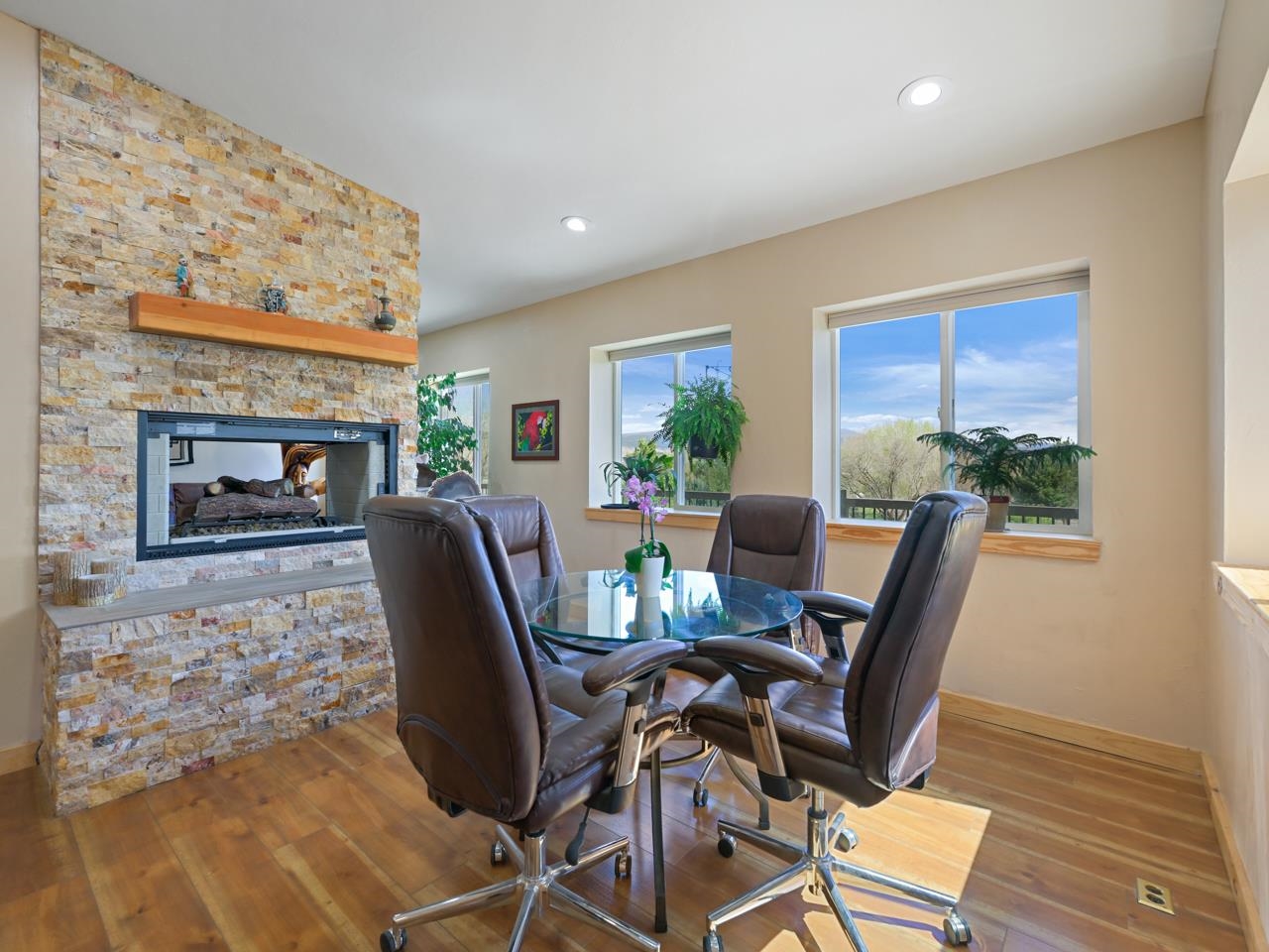2209 Hatton Place Montrose, CO 81401 - Photo 13 of 42 a view of a dining room with furniture window and wooden floor