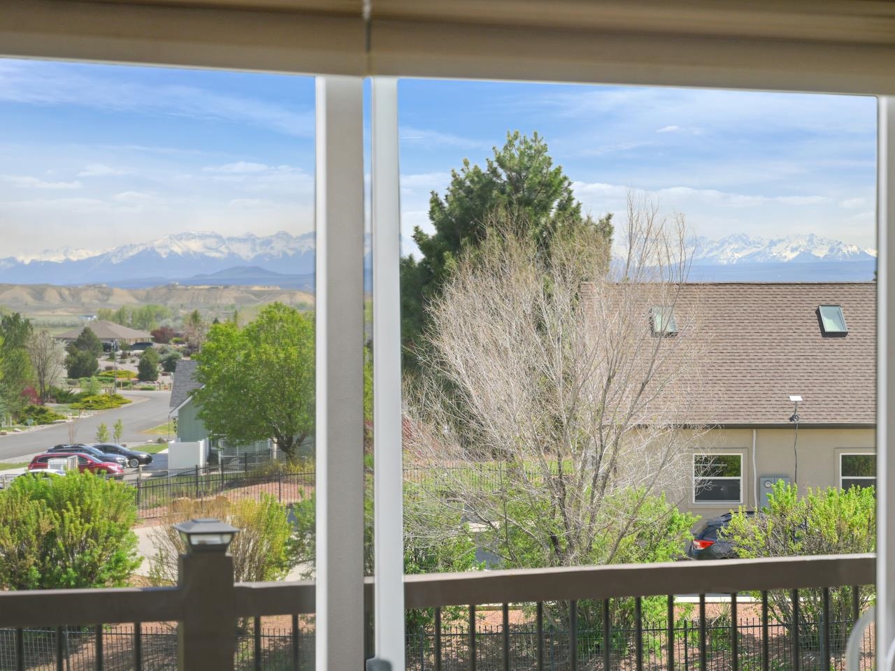 2209 Hatton Place Montrose, CO 81401 - Photo 23 of 42 a view of a balcony with a yard