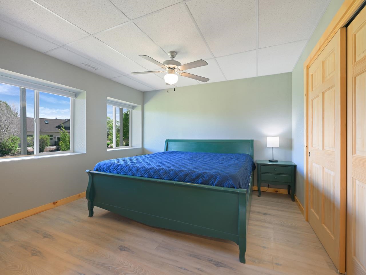 2209 Hatton Place Montrose, CO 81401 - Photo 32 of 42 a bedroom with a bed and a window