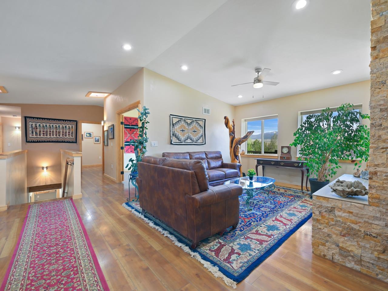 2209 Hatton Place Montrose, CO 81401 - Photo 8 of 42 a living room with furniture and a rug