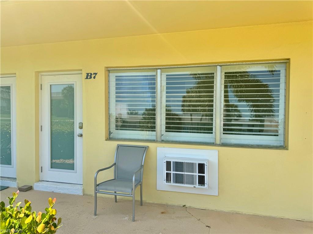 473 12th Avenue South, Unit B7 Naples, FL 34102 - Photo 17 of 21 View of front patio / terrace